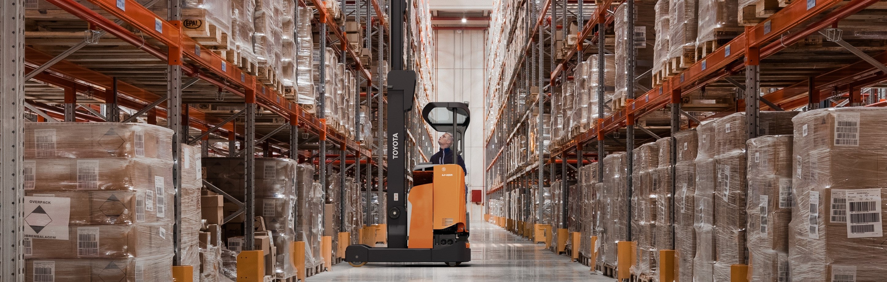 Toyota BT Reflex-series electric reach truck stacking in warehouse