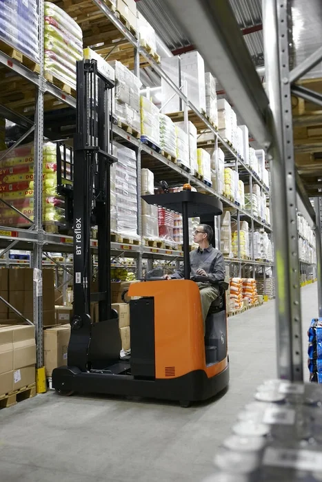 BT Reflex RRE160B reach truck. Application photo in warehouse environment.