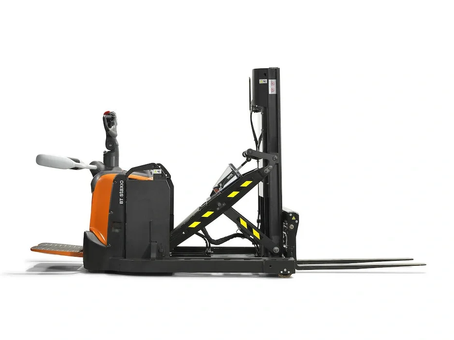BT Staxio SPE120XR, electric stacker with reach mast, platform, and side guards. Product photo taken from the back at an angle.
