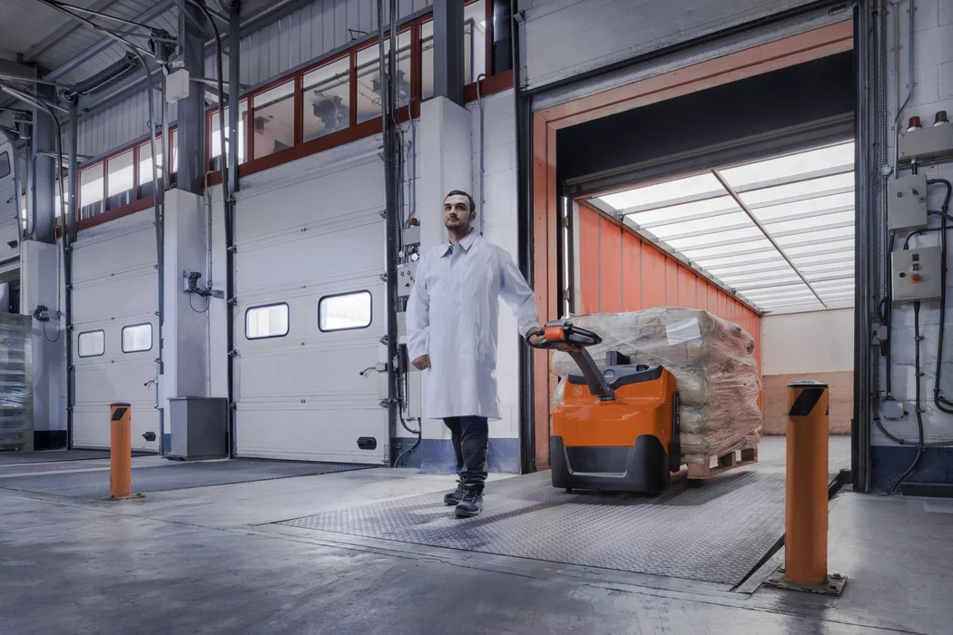 BT Levio LWI160 powered pallet truck, electric walkie low-lifter. Application photo of loading bay. 