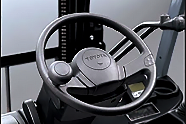 Close-up photo of steering wheel in forklift. 