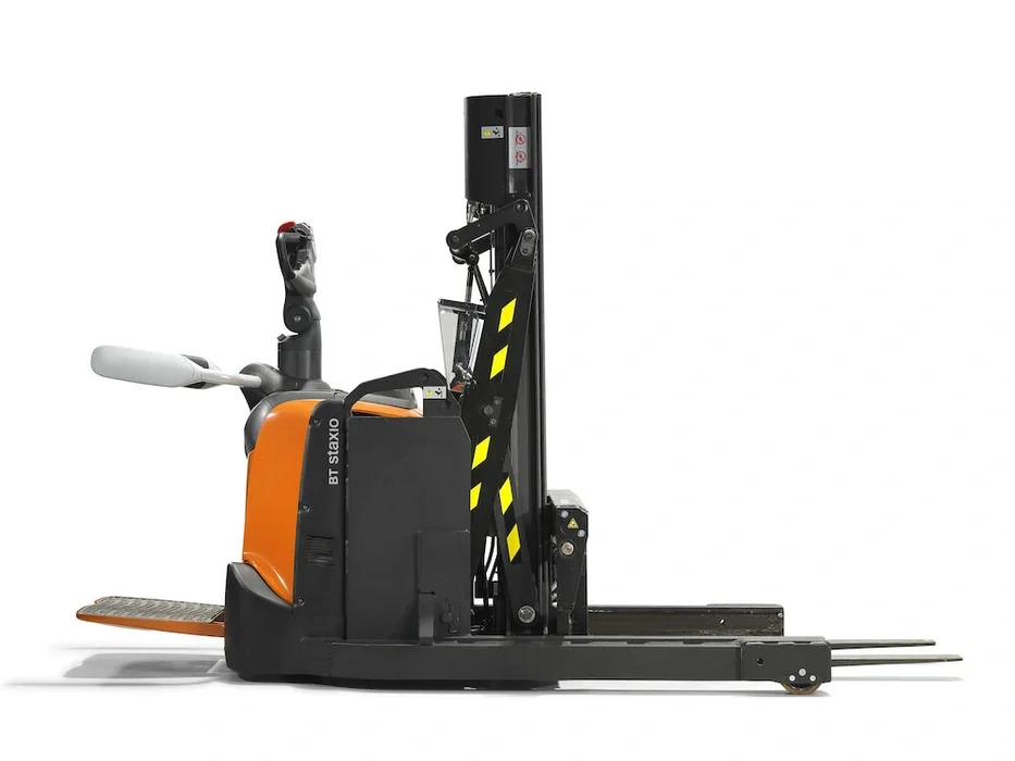 BT Staxio SPE120XR, electric stacker with reach mast, platform, and side guards. Product photo taken from the back at an angle.