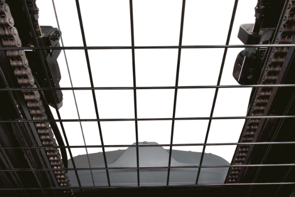 Close-up of visibility over forklift chassi through mast.