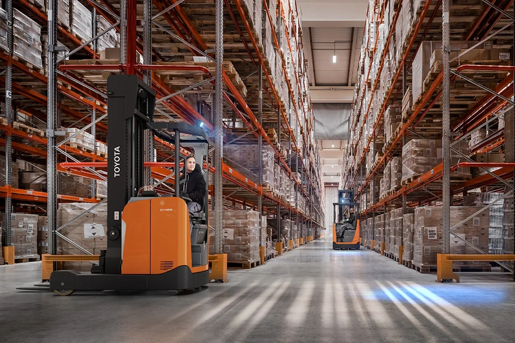 BT Reflex RRE160H reach truck. Application photo in warehouse environment.