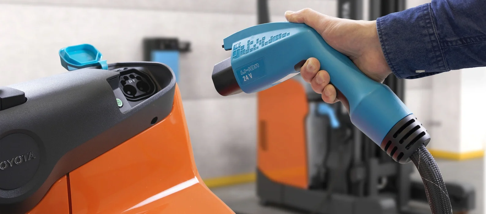 BT Levio LWI160 powered pallet truck, electric walkie low-lifter. Details photo of charging including cobra charger. 